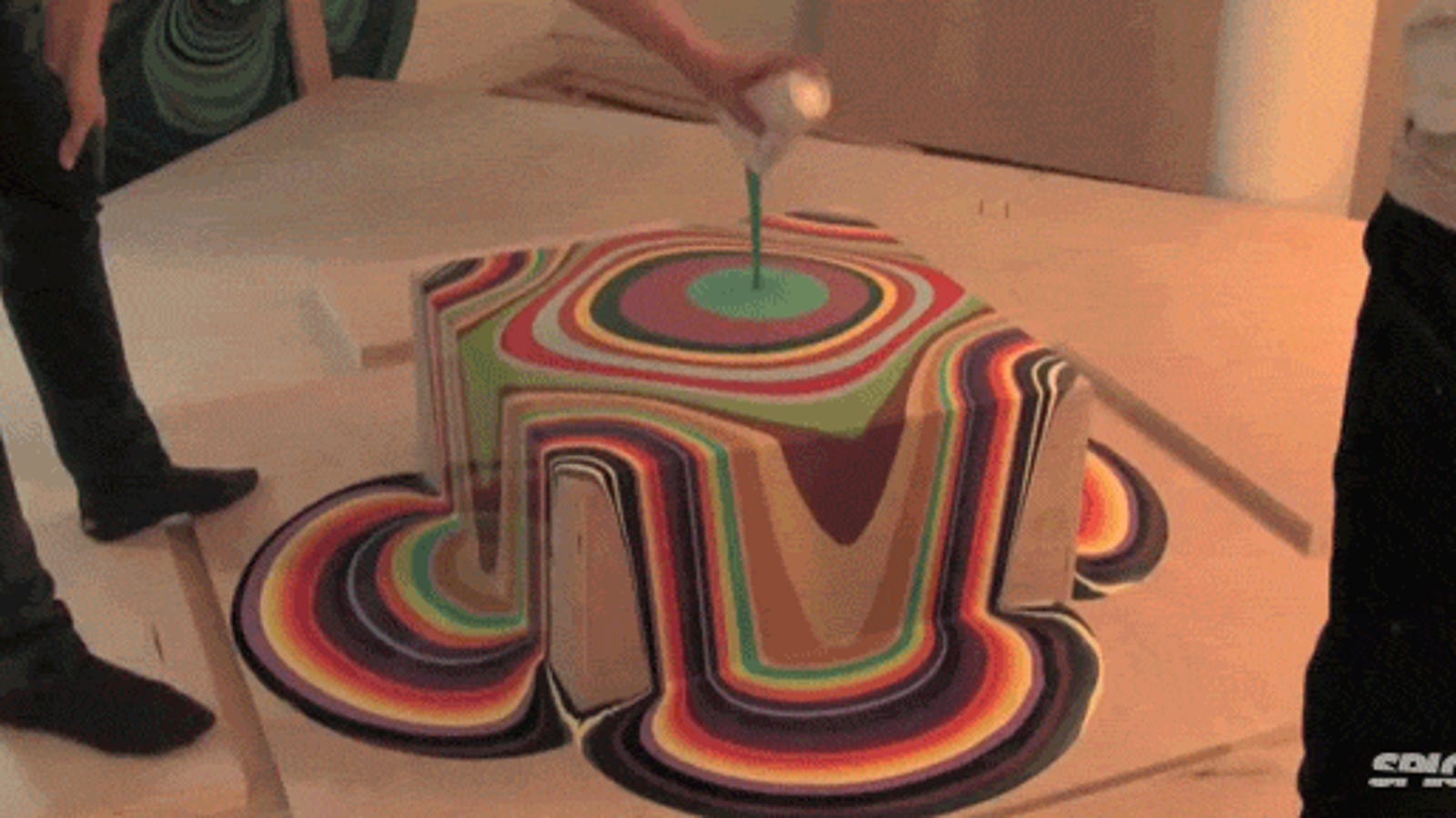 Pouring paint on top of paint creates mind melting art