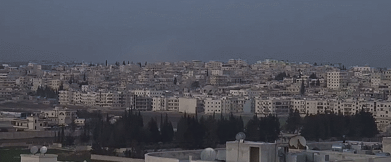 Image animée GIF provenant d'une vidéo de Channel 4 tournée en février 2016 à Alep en Syrie, montrant un bombardement de sous-munitions dans une zone peuplée.