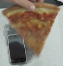 Illustration for article titled More iPhone Destruction, Now With Pizza