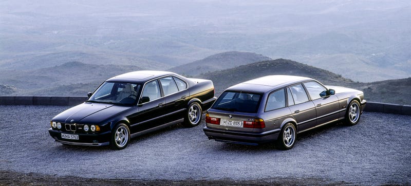 Photo Credit: BMW. That’s a never-sold-in-the-US E34 M5 Touring on the right.