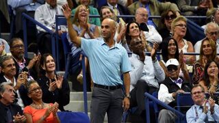 Former tennis player James Blake gets applause Sept. 11, 2015, as he watches a U.S. Open semifinals match in New York City. TIMOTHY A. CLARY/AFP/Getty Images