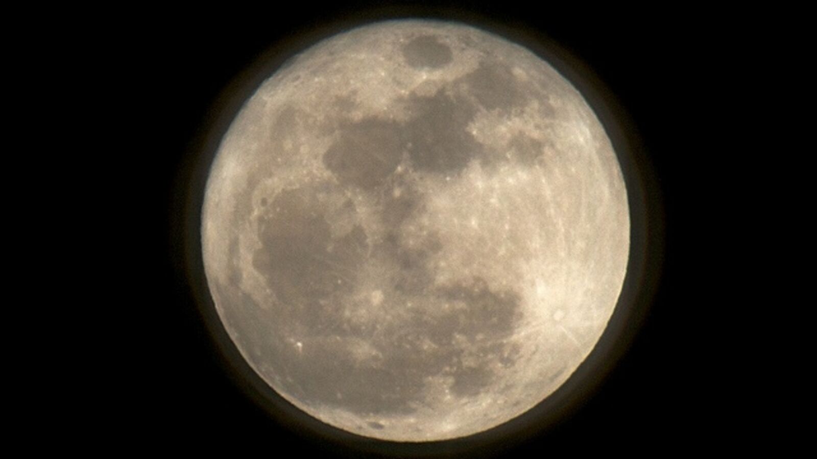 The insane physics that lets us see the Man in the Moon