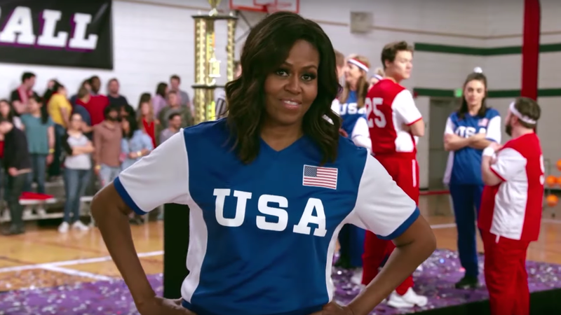 Illustration for article titled Because She Loves Us, Michelle Obama Challenged James Corden to a Dodgeball âBattle of the Sexesâ