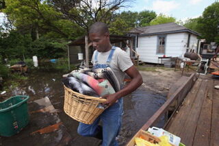 The poor are taking the brunt of the Mississippi flooding. (Getty)