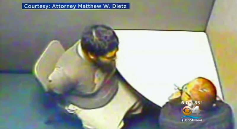 Surveillance footage shows a handcuffed Arnaldo Soto, who is autistic, being interrogated by North Miami Police, even though it was clear that he was unable to answer their questions. (CBS Miami screenshot)