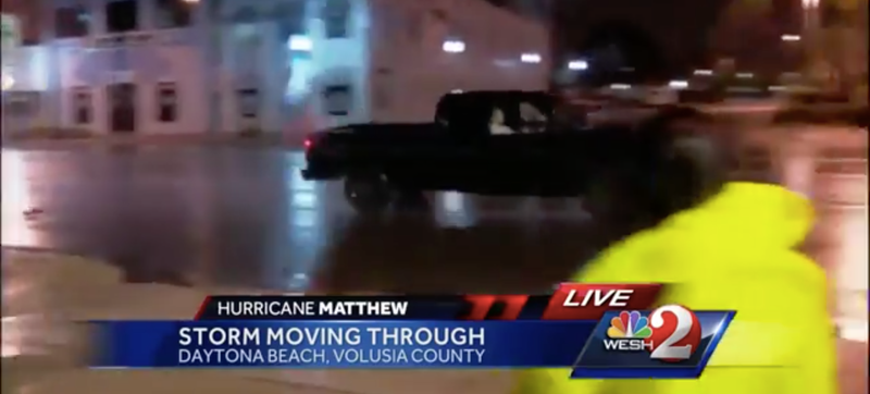 Illustration for article titled Hurricane Matthew Idiot Does Donuts In Front Of Storm And Angry Reporter
