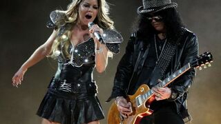 Fergie of the Black Eyed Peas performs with Slash during the Bridgestone Super Bowl XLV Halftime Show at Cowboys Stadium in Arlington, Texas, Feb. 6, 2011.Al Bello/Getty Images