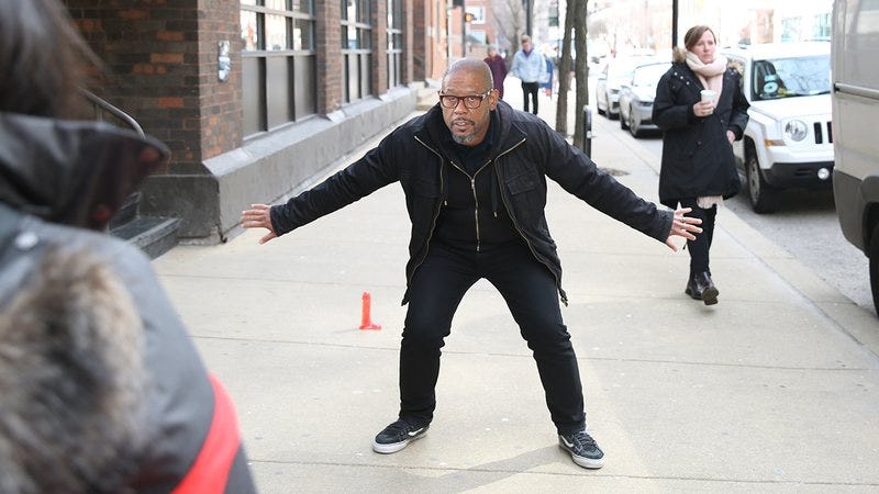 Forest Whitaker blocking people from touching a dildo on the ground.