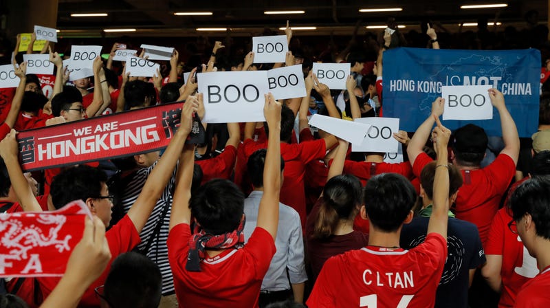 Illustration for article titled Hong Kong Soccer Fans Turn Their Backs And Boo Chinese National Anthem