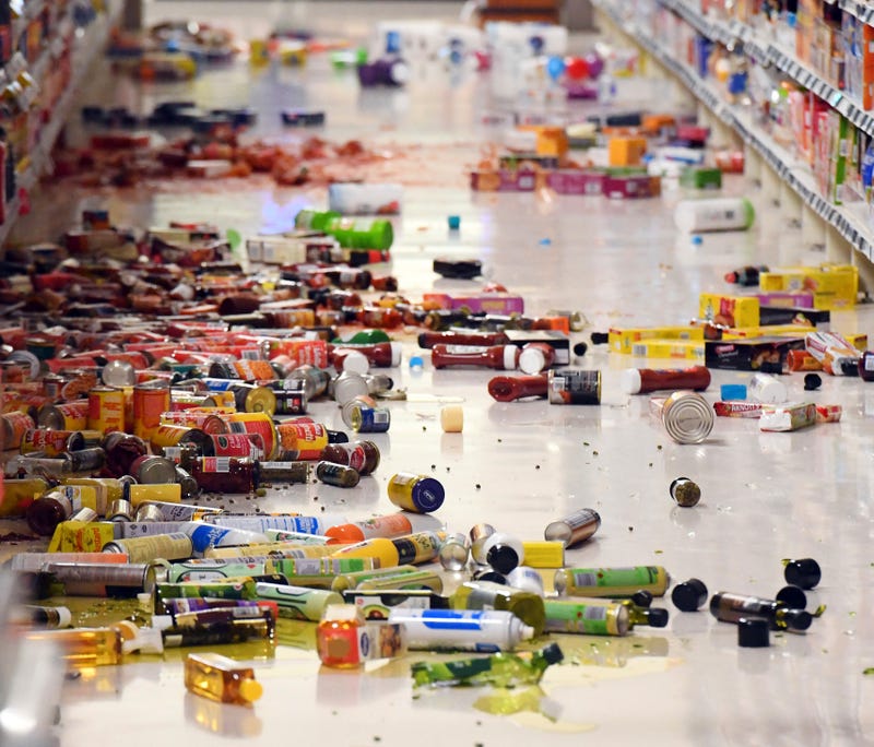 Groceries litter the aisle at the New World, in Miramar area of Wellington. Photo: AP