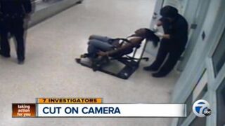 Bernadette Najor was fired from the Warren Police Department in Warren, Mich., after violently cutting a woman's weave from her head. ABC 7 screenshot