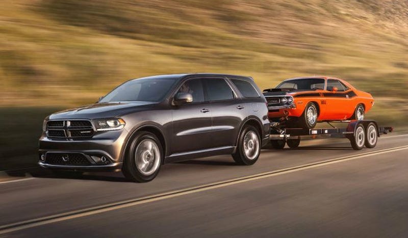 Illustration for article titled Hey Look It's The 2014 Dodge Durango And It Can Tow Cars And Has LEDs