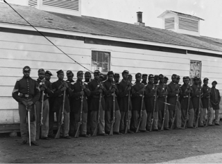 The men in this picture are from Company E, 4th United States Colored Infantry. Theirs was one of the detachments assigned to guard the nation’s capital during the Civil War.Wikimedia Commons