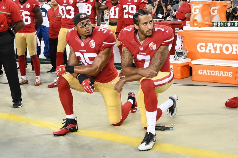 Eric Reid, No. 35, and Colin Kaepernick, No. 7, then of the San Francisco 49ers, kneel in protest during the national anthem prior to playing the Los Angeles Rams in their NFL game at Levi’s Stadium on Sept. 12, 2016, in Santa Clara, Calif.