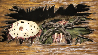 Illustration for article titled The Decaying Body Of Friday The 13th's Jason Lies Inside This Table