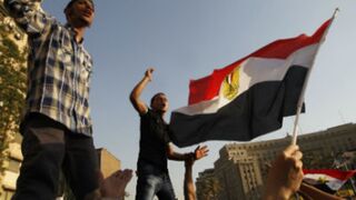 Egyptian protesters shout slogans against Mubarak. (AFP/Getty Images)