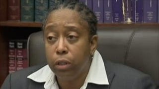 Officer Dolores Sharpe says that she was racially profiled during an arrest last month by colleagues.Screenshot WNBC-TV