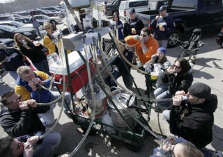 Illustration for article titled Why The Terrorists Hate Us, Reason No. 131: The 12-Person Beer Bong