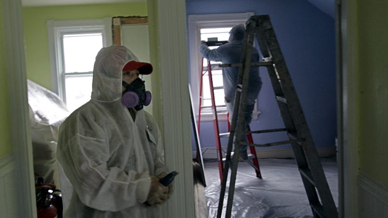 Contractors remove lead contamination from a home in Providence, Rhode Island in 2006. Photo: AP