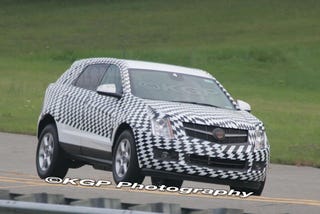 Illustration for article titled 2010 Cadillac SRX Spotted In Minimal, Super Chess Camo