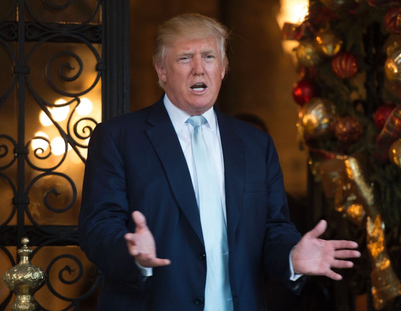 President-elect Donald Trump answers questions from the media after a day of meetings Dec. 28, 2016, at his Mar-a-Lago estate in Palm Beach, Fla.DON EMMERT/AFP/Getty Images