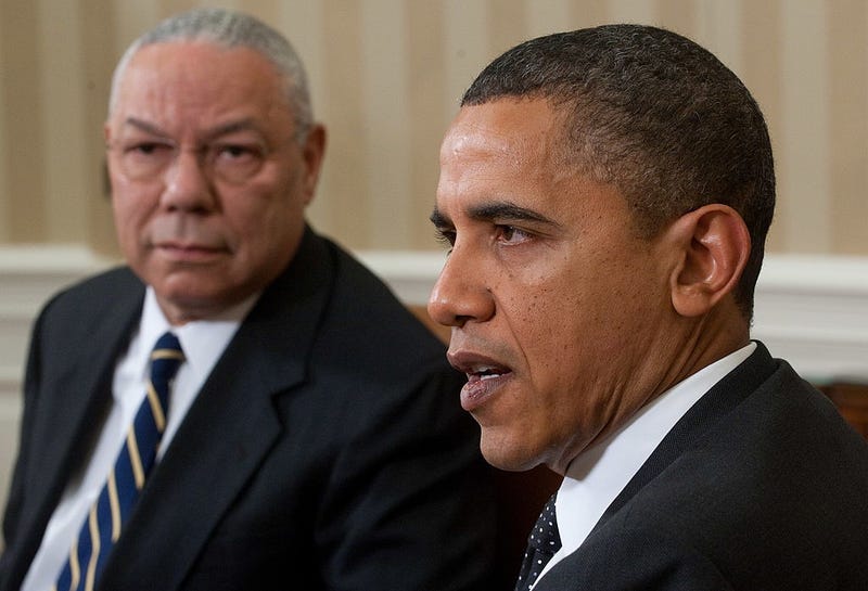 President Barack Obama (right) speaks alongside former Secretary of State Gen. Colin Powell during a meeting in the Oval Office of the White House in Washington, D.C., Dec. 1, 2010. SAUL LOEB/AFP/Getty Images
