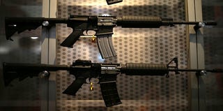 Assault rifles like these were found at Richard Schmidt's house. (Justin Sullivan/Getty Images)
