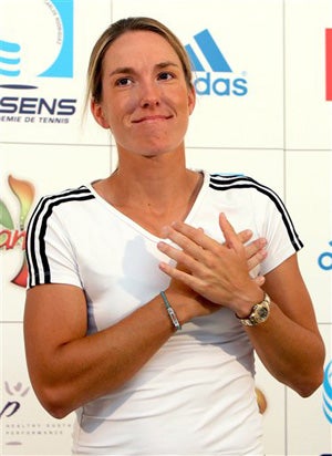 Illustration for article titled Justine Henin Retires • Basket-Weaving Brings Women Together