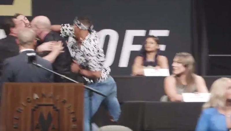 Illustration for article titled Kevin Lee's Joke About Michael Chiesa's Mom Sparks On-Stage Brawl At UFC Press Conference