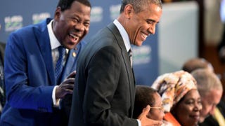 President Boni Yayi of Benin laughs with President Barack Obama as they arrive at “Session 3: Governing the Next Generation” at the U.S.-Africa Leaders Summit in Washington, D.C., Aug. 6, 2014.Jim Watson/Getty Images