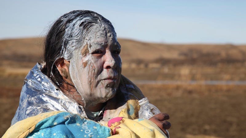 Protester Tonya Stands after being pepper-sprayed, AP.