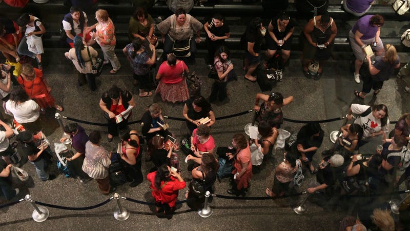 Romance readers wait at the annual Romance Writers of America signing, 2011. Photo via AP Images.