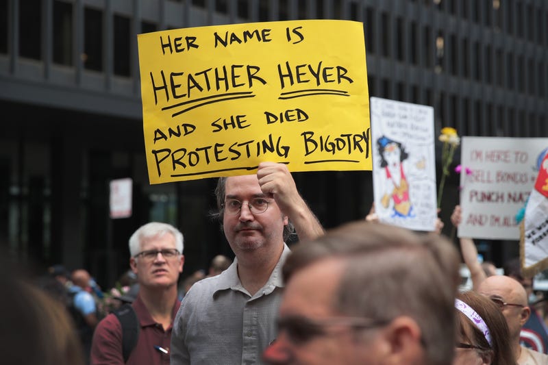 People gather downtown protest the alt-right movement and to mourn the victims of yesterdays rally in Charlottesville, Virginia on August 13, 2017 in Chicago, Illinois.