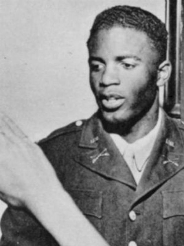 Robinson in uniform at a family gathering (Wikimedia Commons)