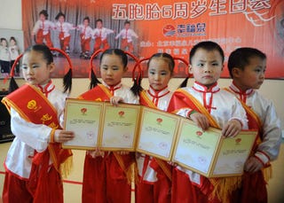 Illustration for article titled Nothing Says 'China, Just Like Us' Like Freak Multiple Birth Pictures!