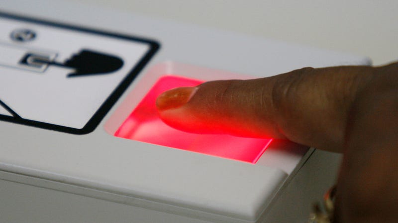 A U.S. visa applicant is fingerprinted by a visa clerk at the U.S. Consulate in Tijuana, Mexico Monday, March 12, 2007.