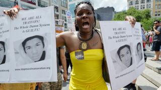 A woman marches at a protest in New York City a day after the Zimmerman verdict. (Stan Honda/AFP/Getty Images)