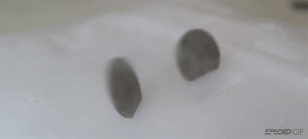 what-happens-when-you-put-a-coin-into-a-block-of-dry-ice-gizmodo