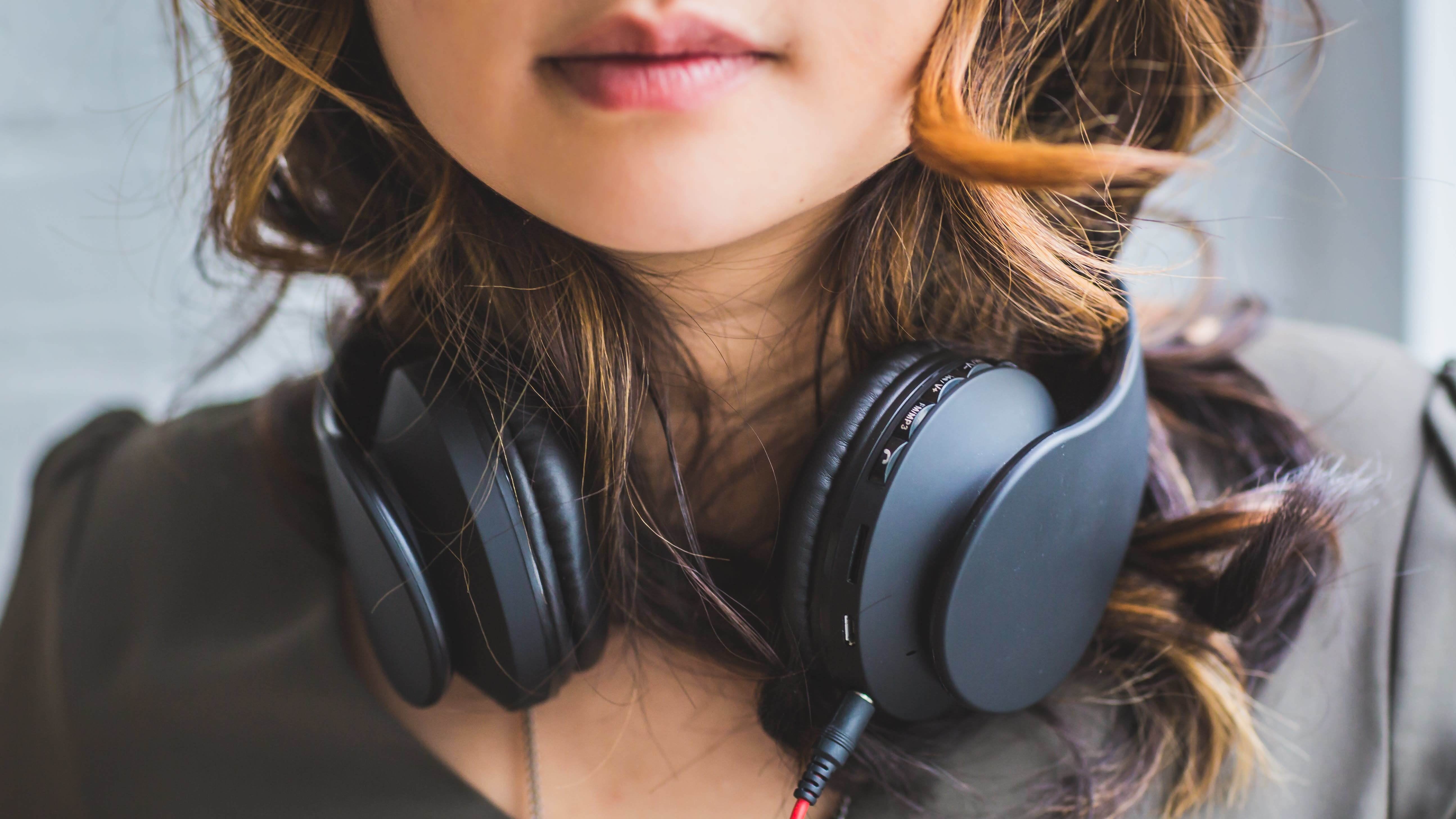 The Best Podcasts To Binge On During A Flight