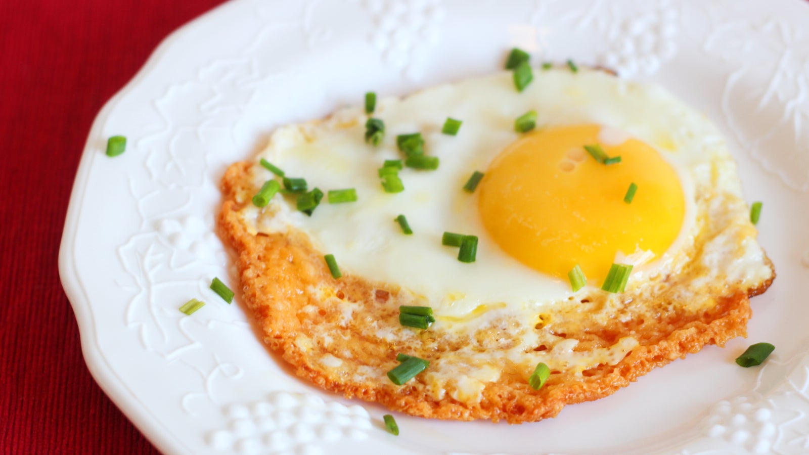 Behold The Cheesy Crispy Glory Of The Frico Fried Egg Lifehacker