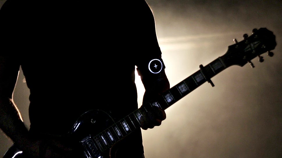 This Wristband's Tactile Vibrations Let Musicians Silently Keep the Beat