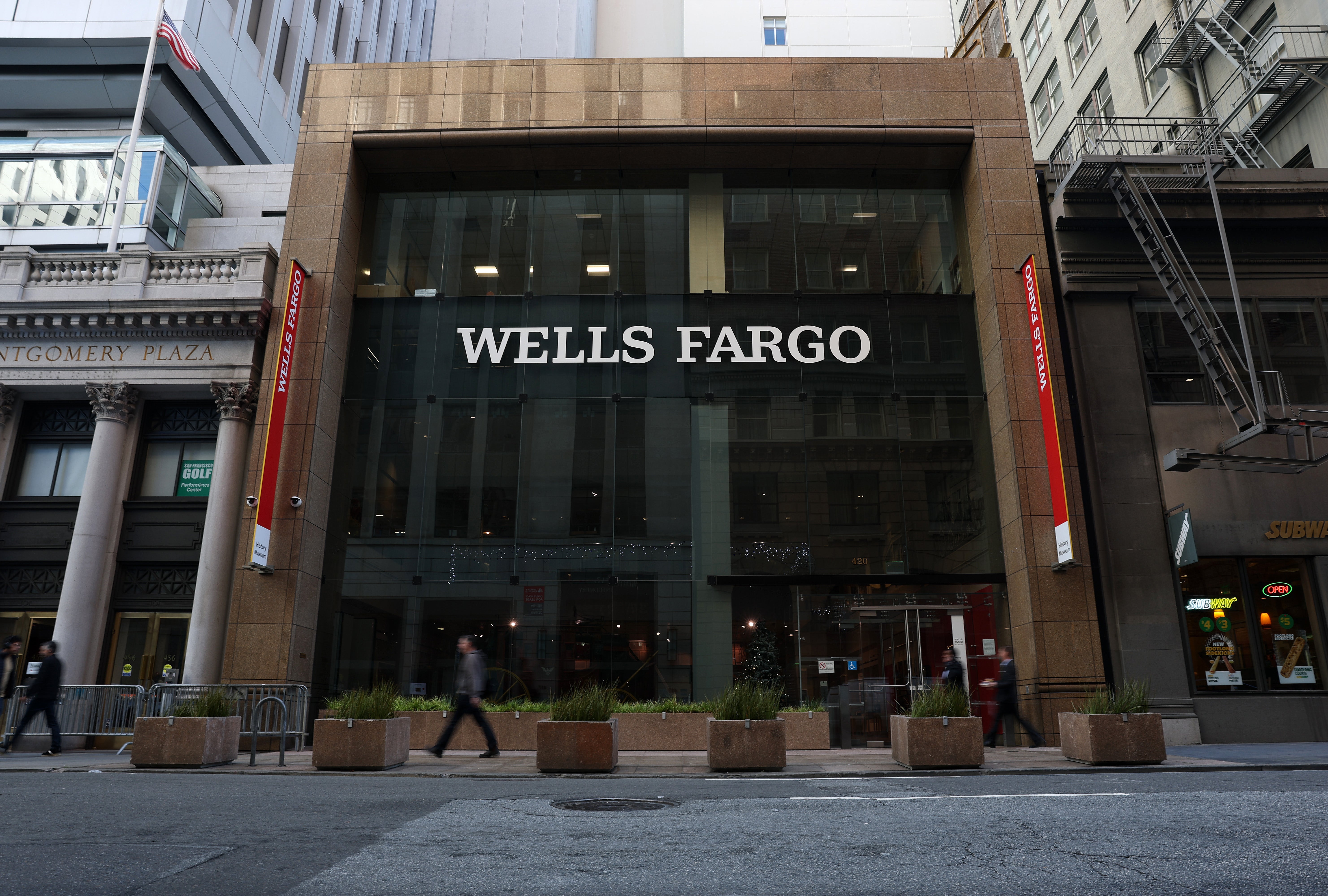 Image for Wells Fargo's handcuffs are off as Fed lifts asset cap imposed in 2018