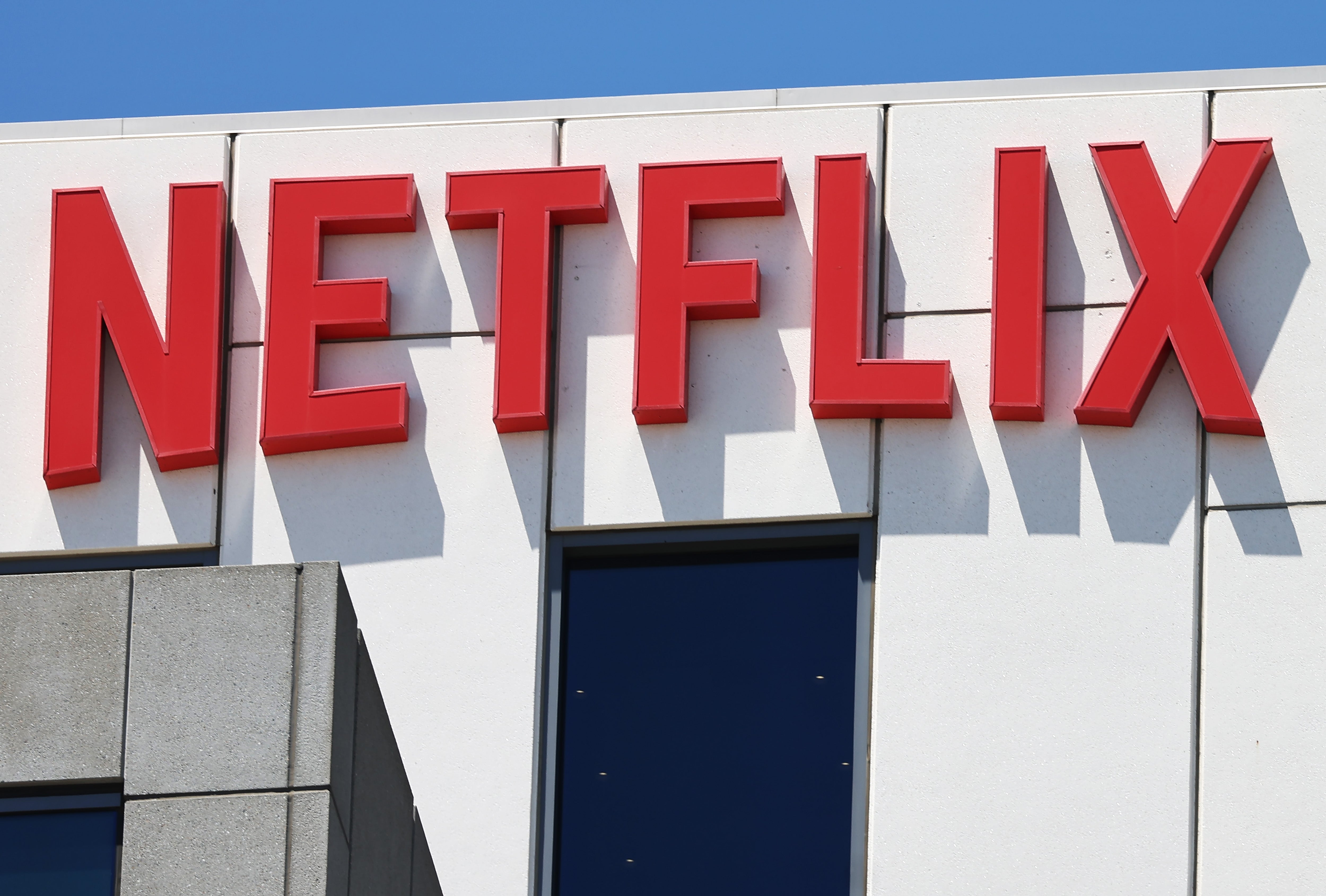 Image for Netflix stock is just humming along while the market bleeds