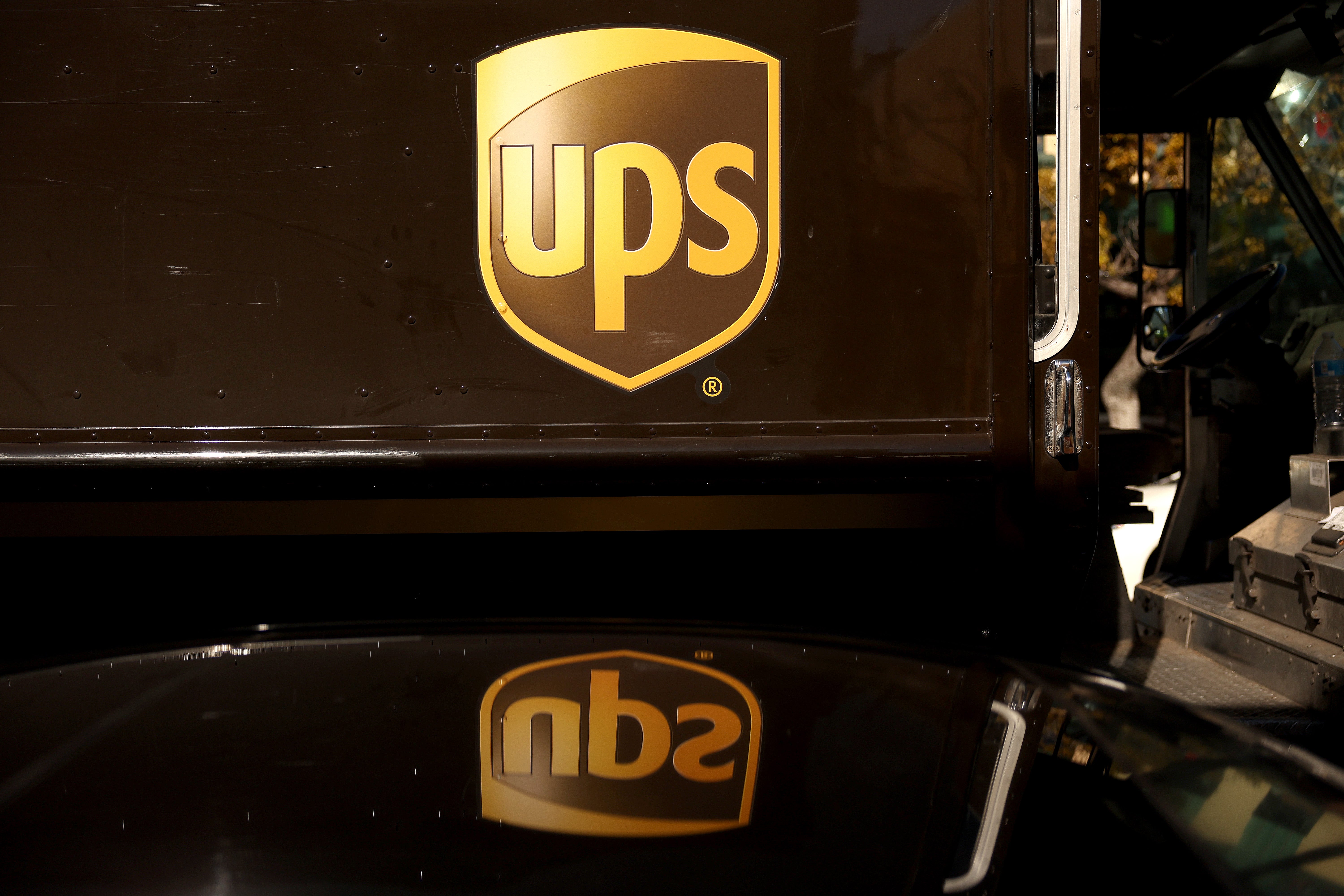 Image for UPS and the post office are both slashing staff