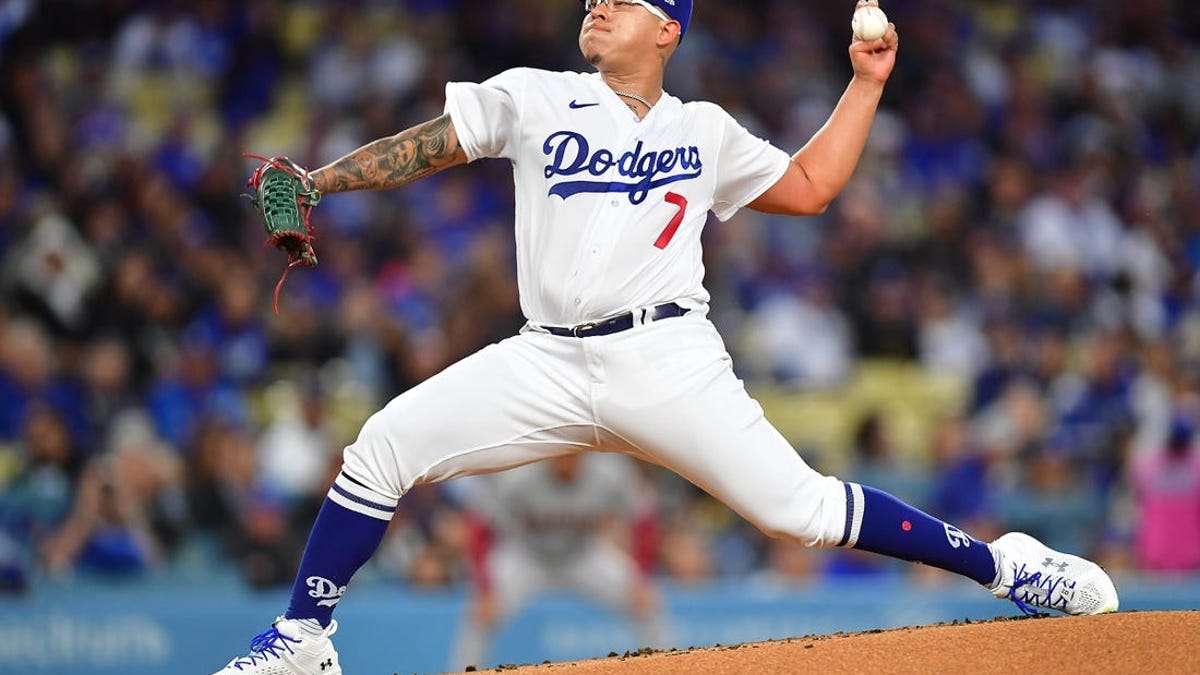 Peralta, Dodgers come back for 2-1 win over Cubs