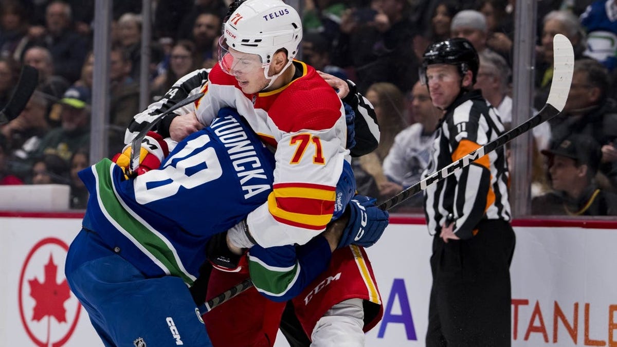 Canucks outlast Flames in shootout, dimming Calgary's playoff hopes