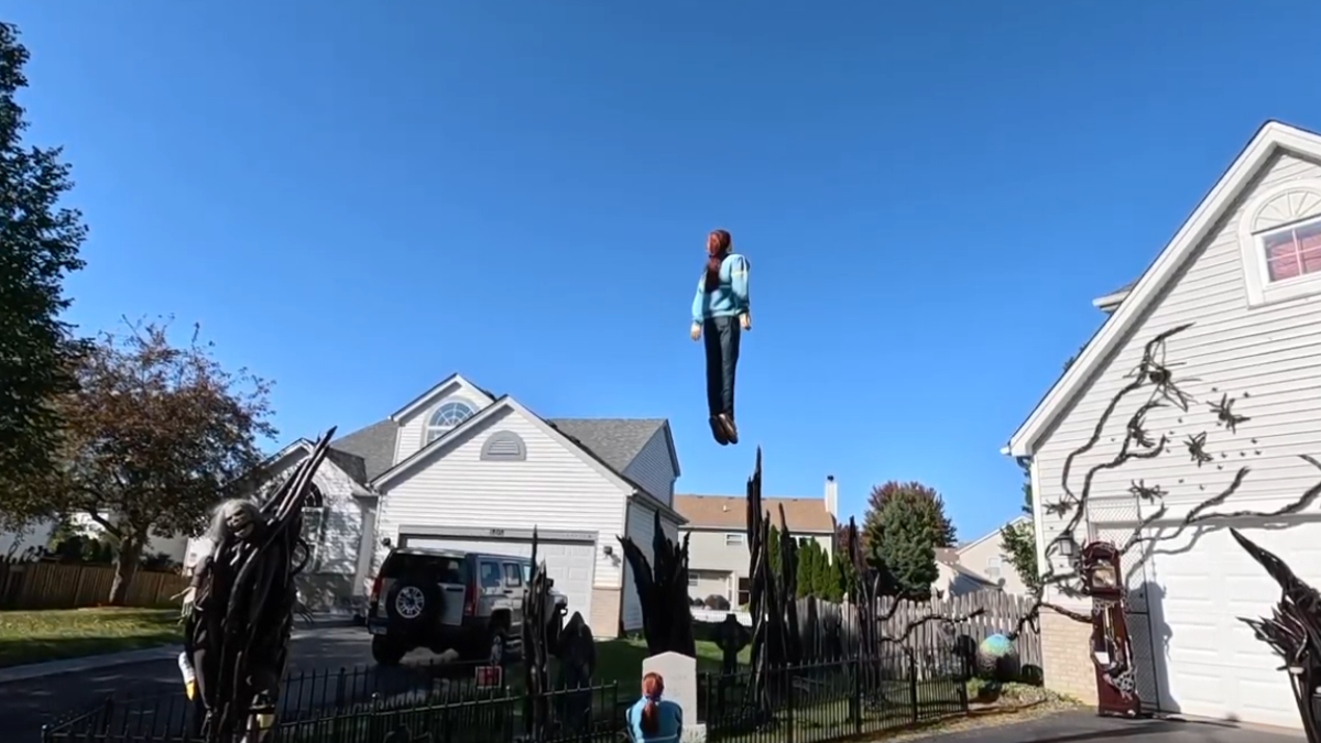 Family makes cool, floating Stranger Things Halloween display