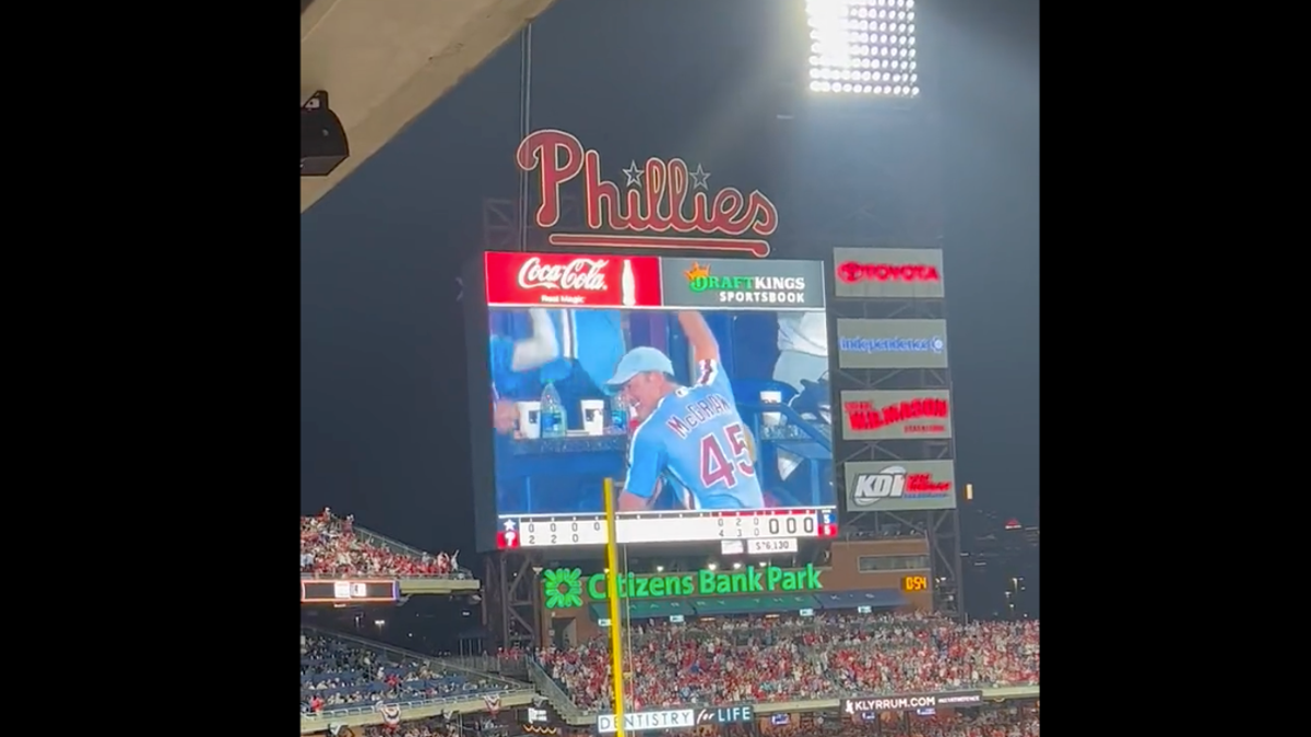 Tim McGraw Sports His Father's Phillies Jersey While Attending
