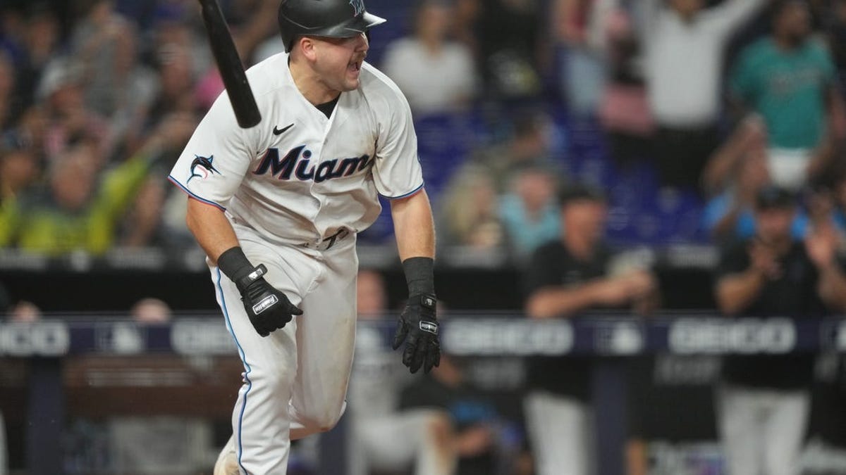 Marlins hold on for tight win over Brewers