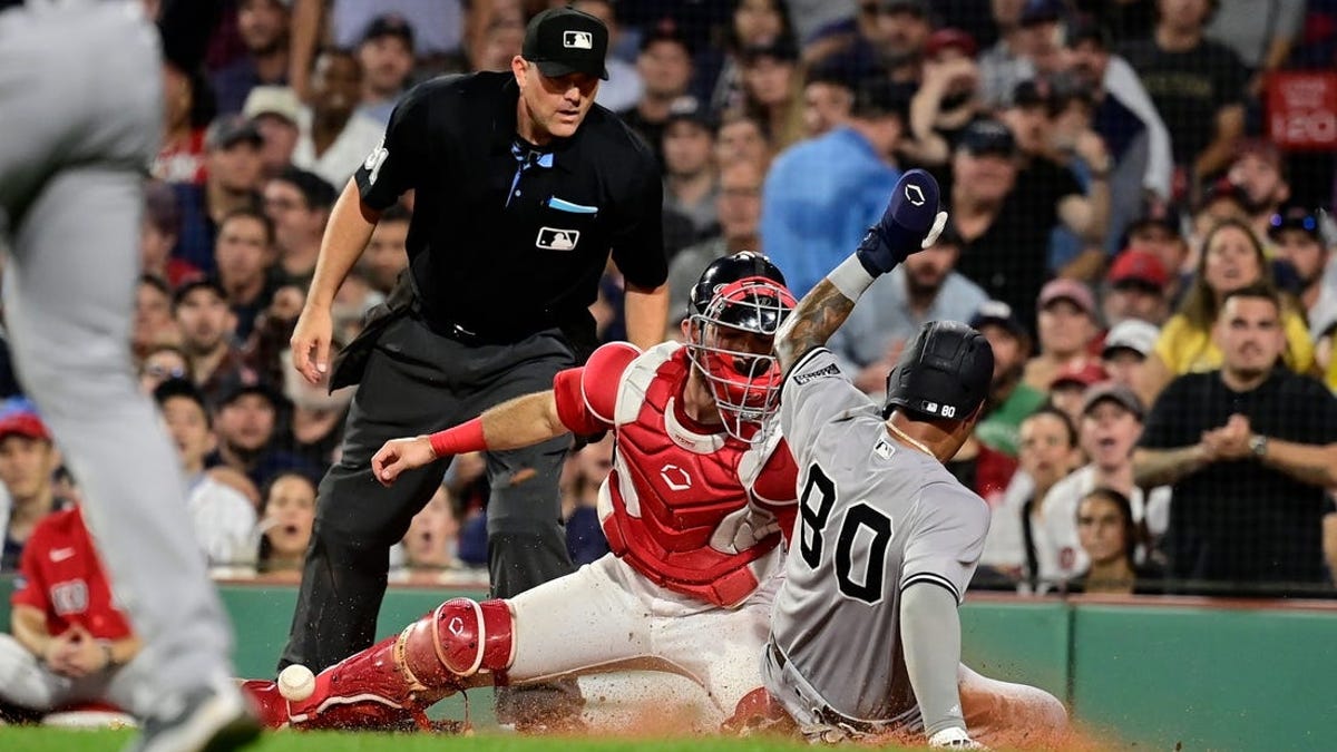 Red Sox lose rain-shortened game, Yankees complete 4-game sweep